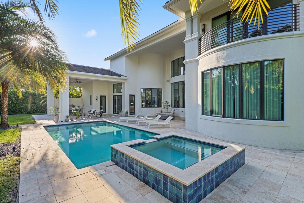 Photo of 2702 NW 71st Boulevard, Boca Raton, FL 33496 (MLS # B26027097)