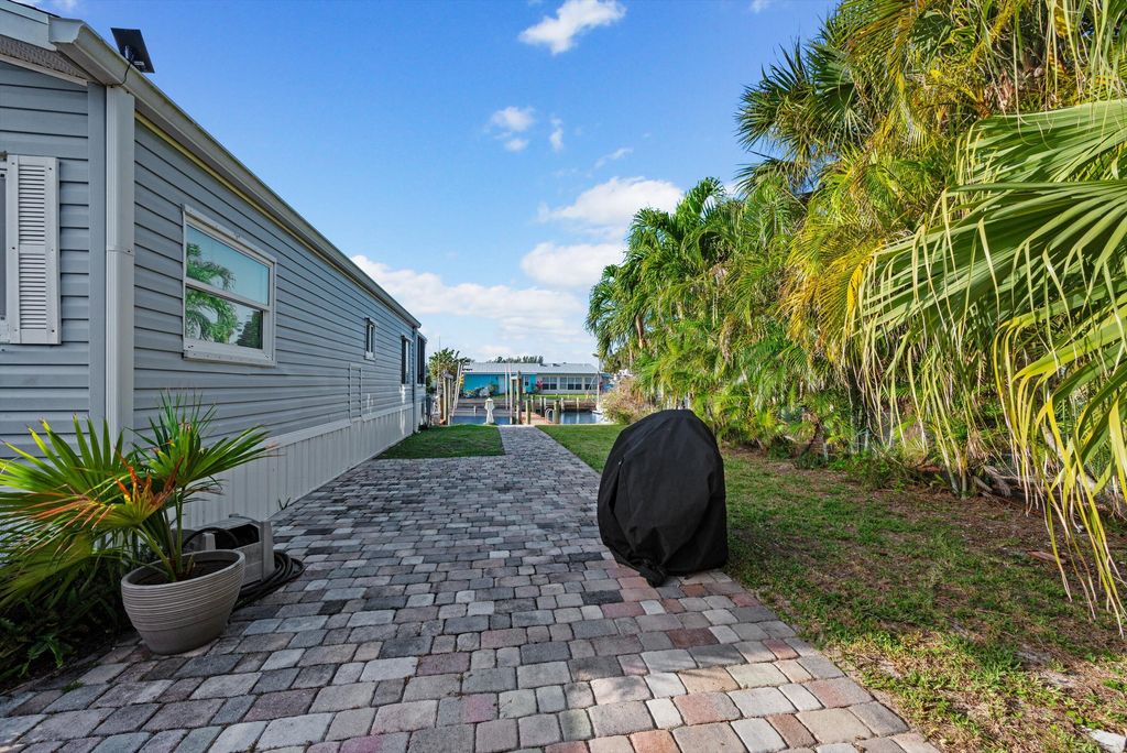 Photo of 10851 S Ocean Drive, Jensen Beach, FL 34957 (MLS # B26003607)