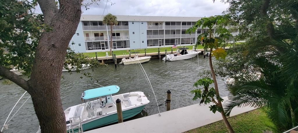 Photo of 1125 Lake Shore Drive #202, Lake Park, FL 33403 (MLS # R10888726)