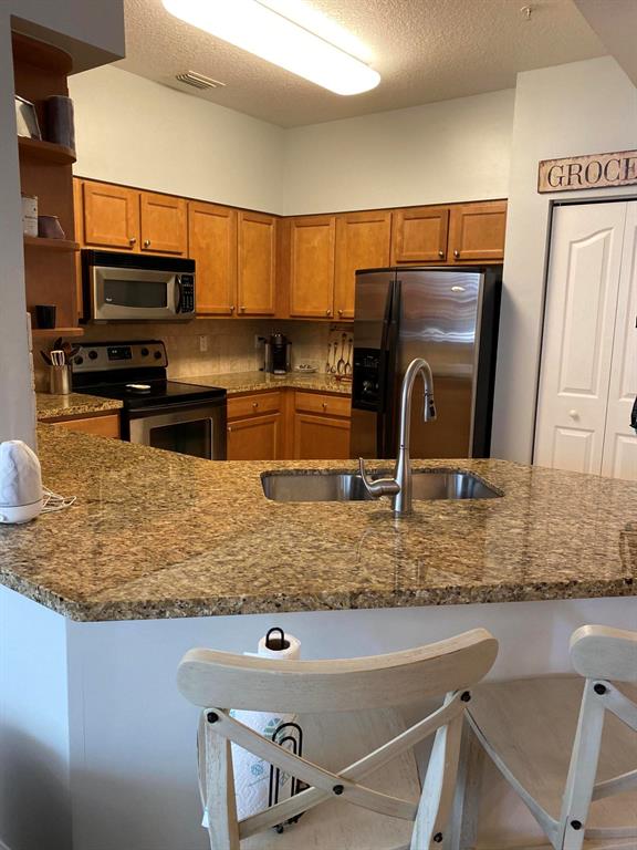 SOMERSET AT ABACOA CONDO - Residential