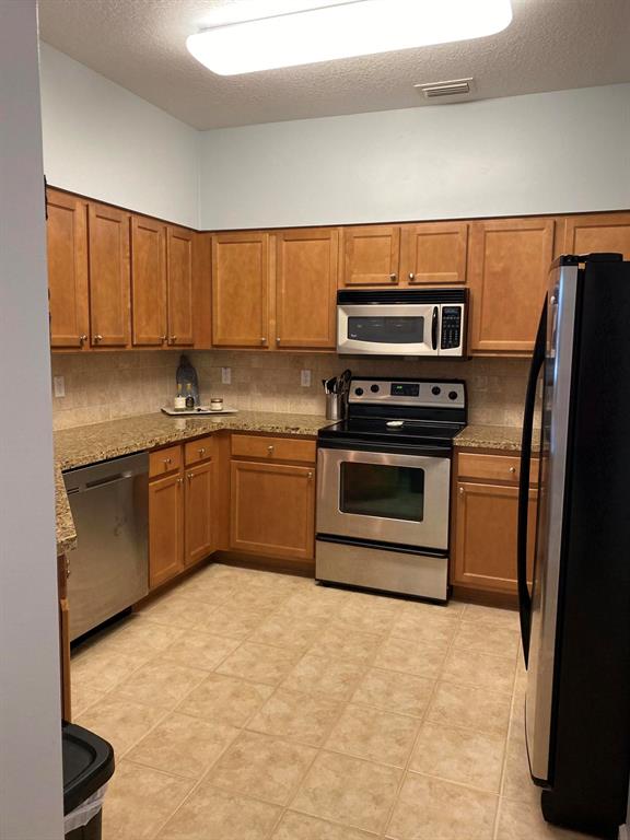 SOMERSET AT ABACOA CONDO - Residential