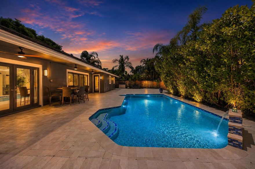 Beautifully updated 4-bedroom modern ranch-style home in the highly desirable Pembroke Lakes community of Pembroke Pines. Featuring one of the largest and most sought-after floor plans in the neighborhood, this corner-lot property offers abundant parking plus space for your boat or RV — and NO HOA! Enjoy open-concept living with vaulted ceilings, spacious rooms, and seamless indoor-outdoor flow to your private backyard oasis with pool. Additional highlights include a circular driveway, impact windows and doors, full-house water filtration system, and new ductwork. Located in a neighborhood with A-rated schools, just minutes from Memorial Hospital West and Shops at Pembroke Gardens, plus shopping, dining, and entertainment. Convenience, comfort, and lifestyle all in one.