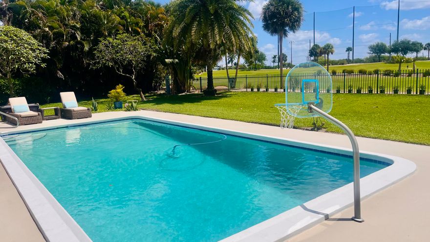 Unobstructed Views from this stunning 5 Bedroom plus Den home overlooking the North Palm Golf Course will not disappoint. In 2014 the house was completely renovated and re-designed. 3,578 sf under air and 4,220 sf total, plus an oversized pool make this home perfect for large families! Once entering, you are immediately greeted by spectacular views of the pool and golf course. The open concept floor plan and high-end finishes are impressive. The open kitchen features top-of-the line appliances and even a built-in Miele coffee station. Both the master bedroom and the north-side guest room have en-suite baths and lead directly to the pool deck. The large backyard features a meditation area, lush landscaping, room for a summer kitchen, and spectacular unobstructed view of the golf course. Please note that the screen enclosure for the pool deck was just removed and are still pictured in some photos. Being only 2 lots away from the shortcut to the Country Club makes this a very desired location. North Palm is golf-cart friendly. Walk, bike, or take your golf cart right up to the club for happy hour, tennis, or a game of golf. Don't miss the opportunity to tour this amazing property!