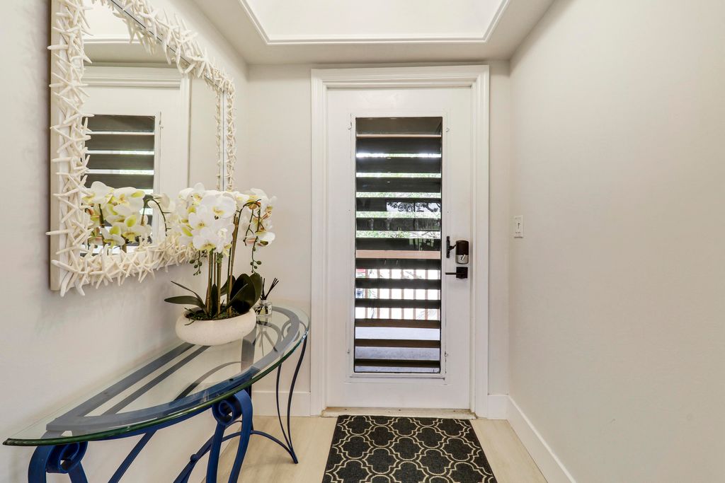 Photo of 438 Brackenwood Lane S, Palm Beach Gardens, FL 33418 (MLS # B26005890)