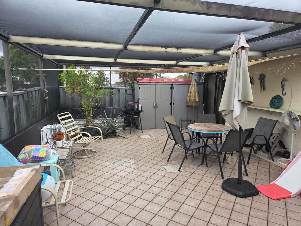 Photo of 1333 Peppertree Trail #Apt C, Fort Pierce, FL 34950 (MLS # R11158611)