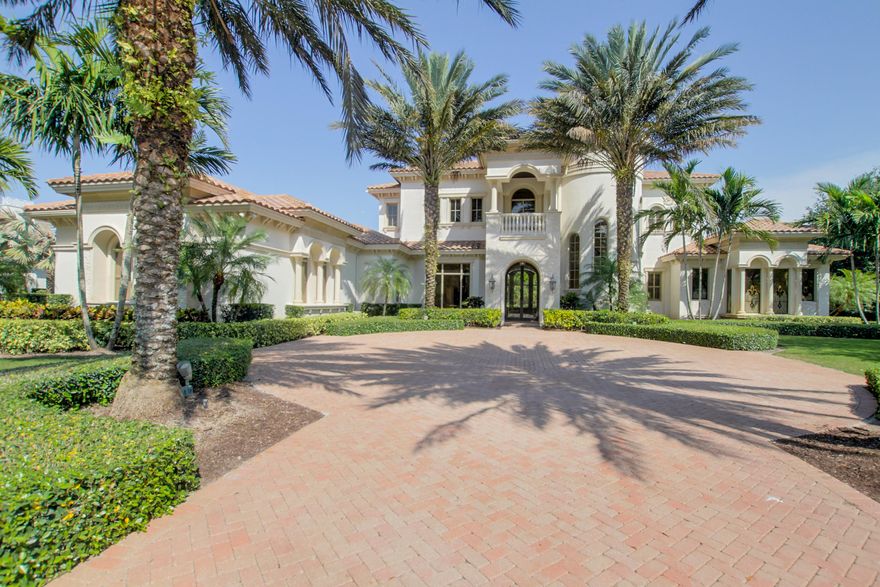 This spectacular Courchene Development custom estate is on one of the premier custom one acre golf view lot's. With over 7100 sq feet of air conditioning space that includes 5 bedrooms,6 full and 2 half baths, gourmet kitchen, stunning club/billiard room, wine room, up and down wet bars, beamed ceilings, large screened lanai with outdoor fireplace summer kitchen and bar, custom Caribbean style lap pool and spa, custom wood detail throughout, custom built in closets, custom inlaid marble and wood flooring, upstairs loft and large covered veranda that over looks spectacular views of the pool and golf course. The large master bedroom comes with an exercise area and a golf view , large built in custom walk in closets and electric shades, custom lighting and sound throughout,. This is a must se