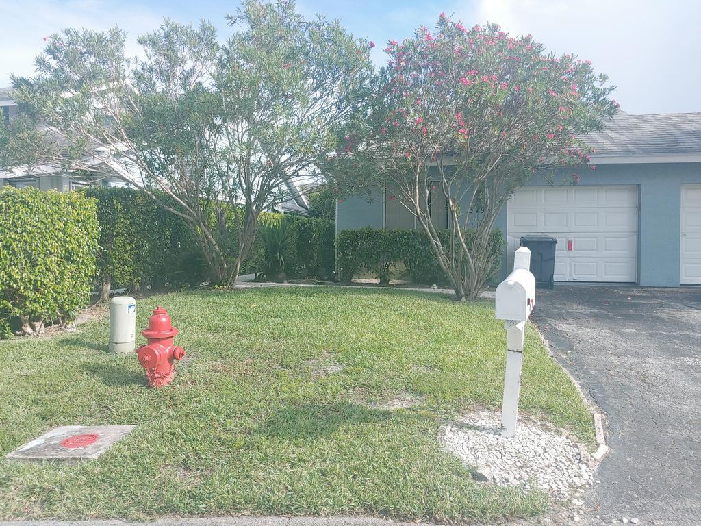 Photo of 3795 Island Club Circle Cir E #10, Lake Worth, FL 33462 (MLS # R10814580)