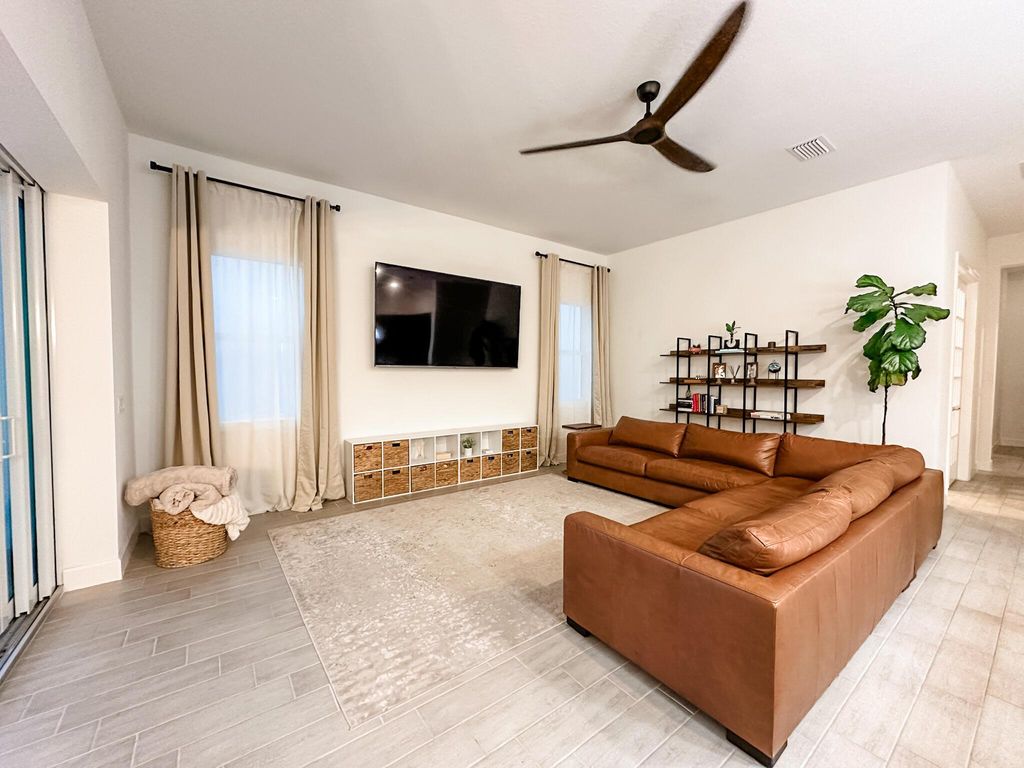 Photo of 9865 SW Meridian Way, Stuart, FL 34997 (MLS # R11092751)