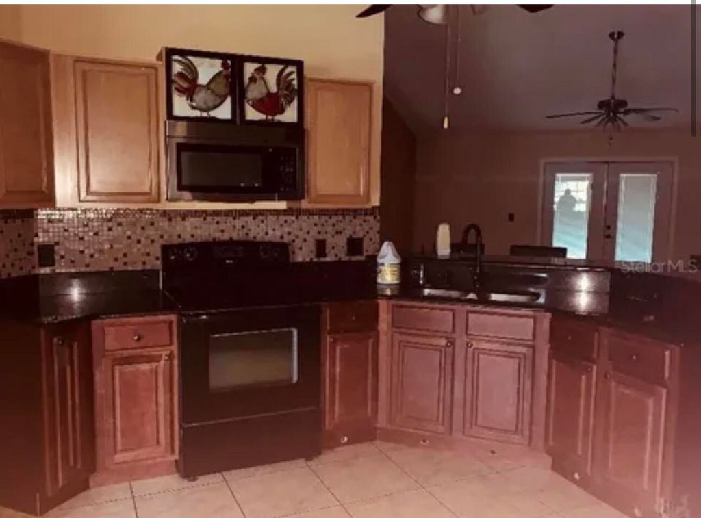 Photo of 704 Caracara Court, Kissimmee, FL 34759 (MLS # B26032767)