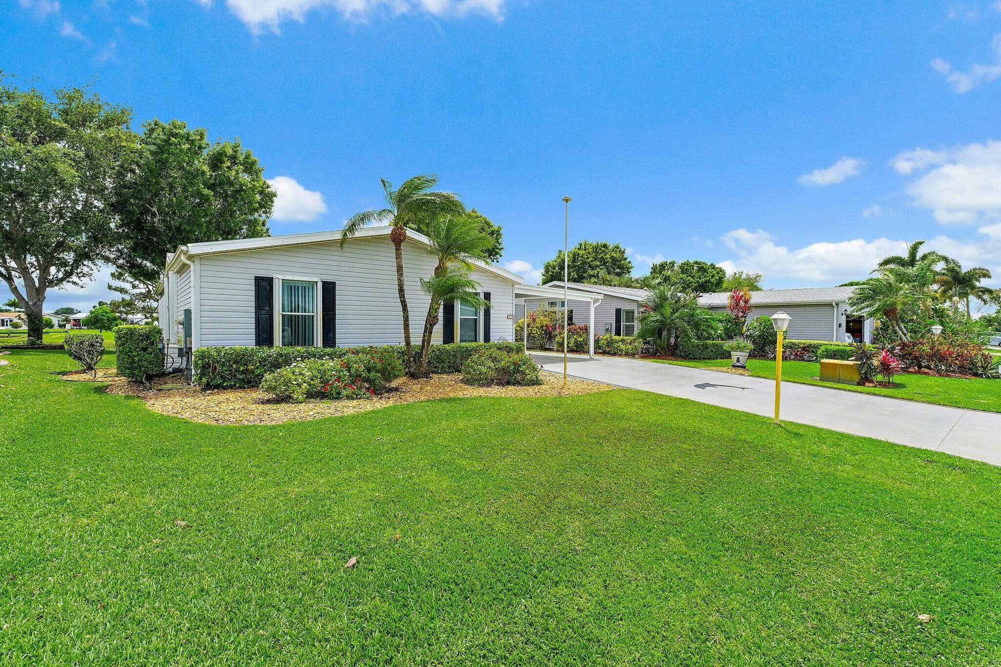Savanna Club 55+ community~Soak up the sunrises, sunsets and privacy in quiet cul-de-sac lot that fronts the golf course and nature preserve. Home features 2 spacious BR's, 2 BA's, + an office/den or 3rd bedroom in a desirable split plan layout. Home is move in ready with updates that include newer wood cabinetry kitchen with soft close doors and drawers, granite counter tops, stone backsplash accents, 12/2024 Stainless Steel appliances, wood lam. flooring, 2020 roof, 12/2023 A/C, new lighting fixtures, modernized faucets, all new electrical outlet upgrades and an enclosed lanai for year round enjoyment. Home is fully equipped with accordion shutters, a decor drive for ease in maintenance and a cost saver irrigation well. All measurements are approximate, buyer to verify. Land Lease