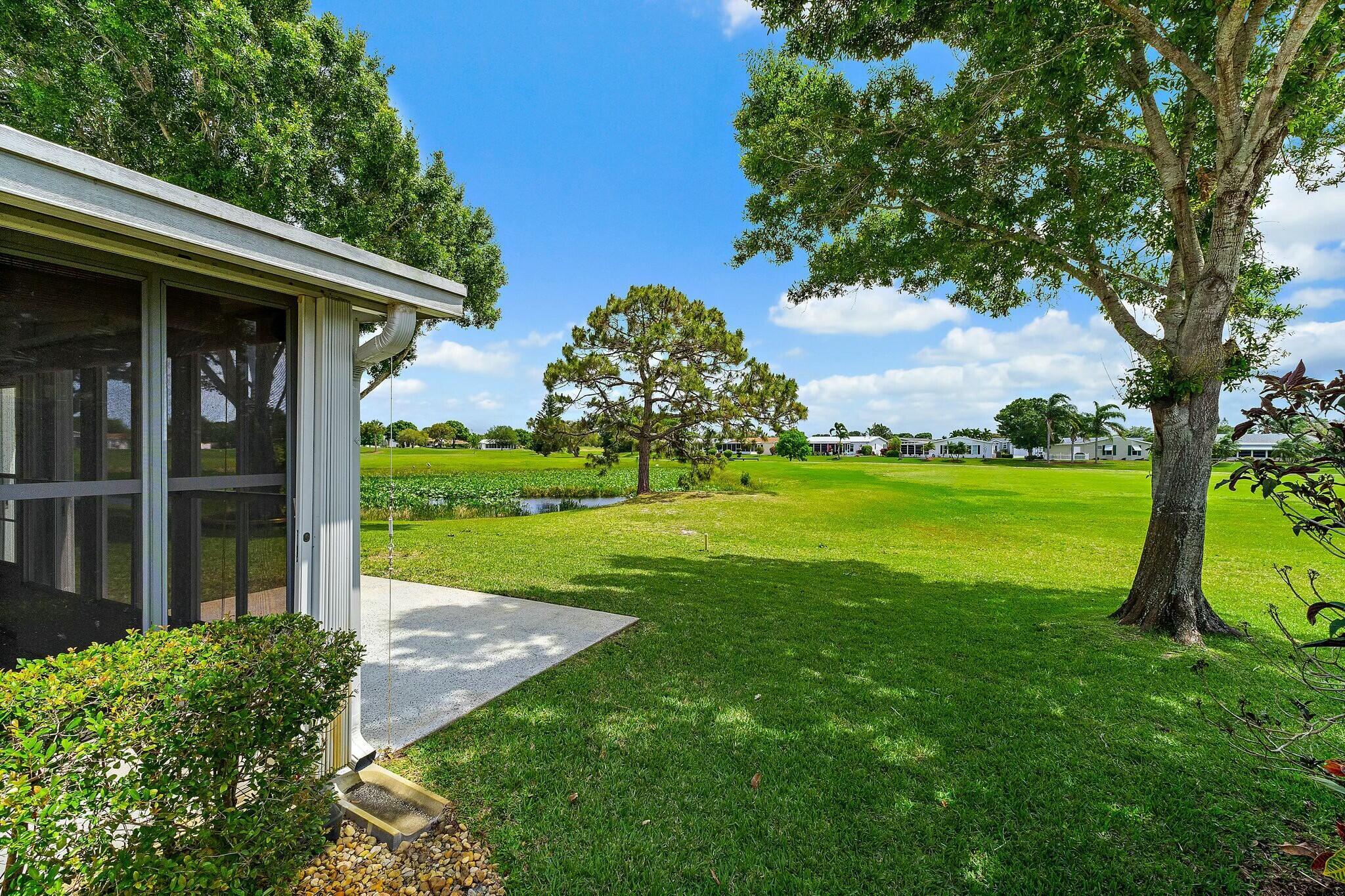 Savanna Club 55+ community~Soak up the sunrises, sunsets and privacy in quiet cul-de-sac lot that fronts the golf course and nature preserve. Home features 2 spacious BR's, 2 BA's, + an office/den or 3rd bedroom in a desirable split plan layout. Home is move in ready with updates that include newer wood cabinetry kitchen with soft close doors and drawers, granite counter tops, stone backsplash accents, 12/2024 Stainless Steel appliances, wood lam. flooring, 2020 roof, 12/2023 A/C, new lighting fixtures, modernized faucets, all new electrical outlet upgrades and an enclosed lanai for year round enjoyment. Home is fully equipped with accordion shutters, a decor drive for ease in maintenance and a cost saver irrigation well. All measurements are approximate, buyer to verify. Land Lease