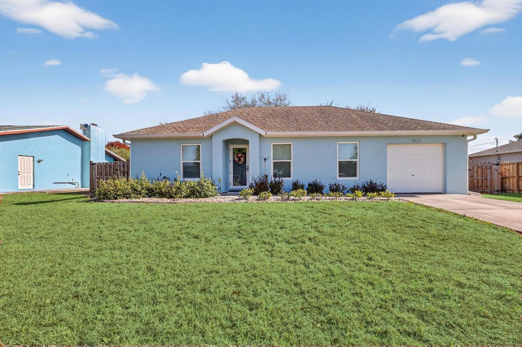 Photo of 1011 SE Euclid Lane, Port Saint Lucie, FL 34983 (MLS # R11166933)