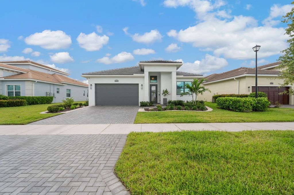 Photo of 9536 SW Pepoli Way, Port Saint Lucie, FL 34987 (MLS # R11129306)