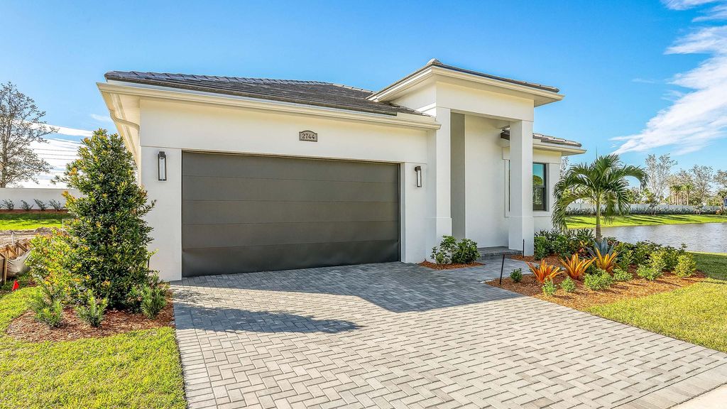 Photo of 2744 SE Ashfield Drive, Port Saint Lucie, FL 34984 (MLS # R10909926)
