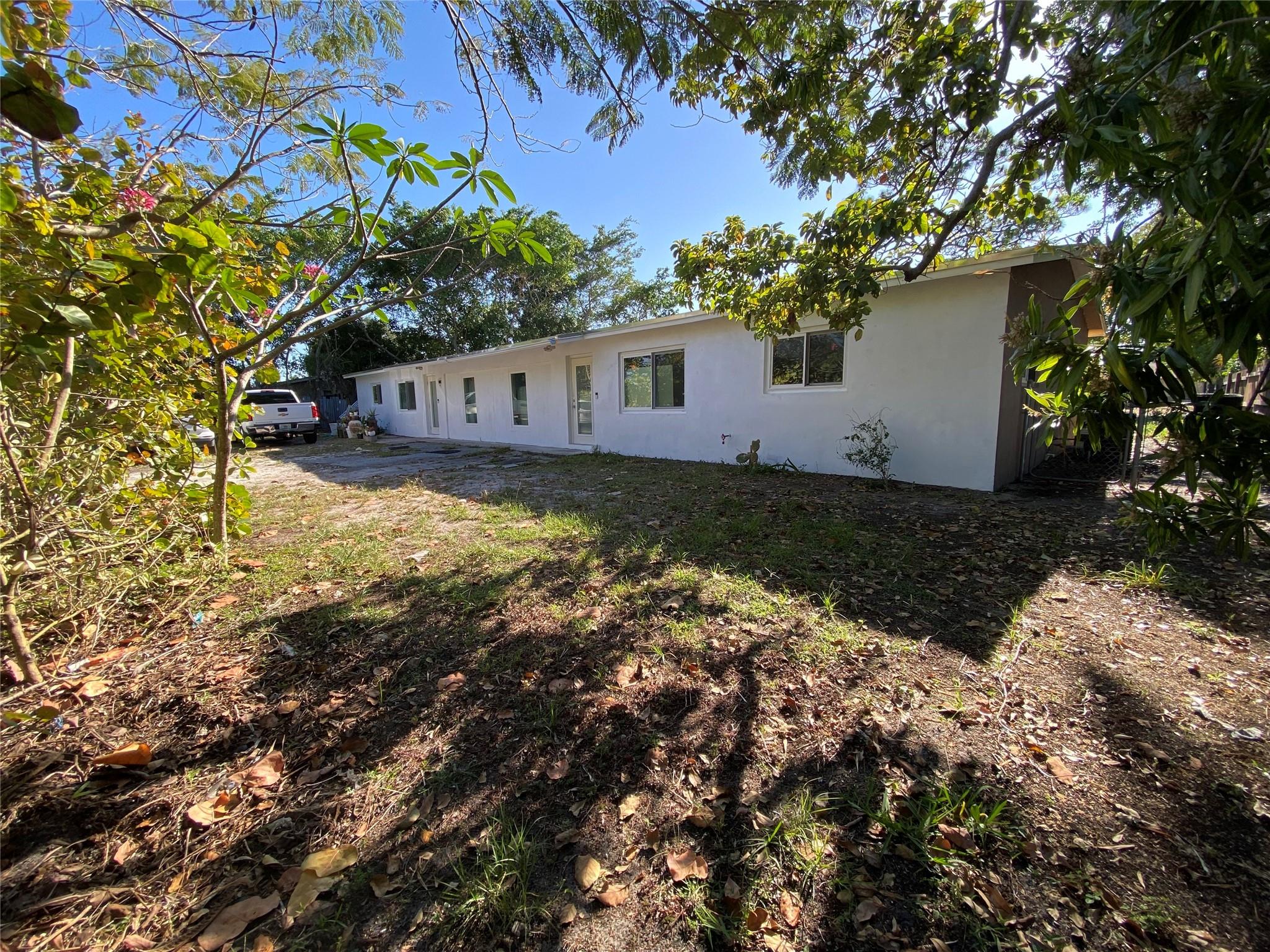 NEW ROOF- IMPACT WINDOWS NEW ELECTRICAL FPL CONNECTIONS AND NEW OUTSIDE PANELS AND NEW INSIDE BREAKERS- NEW FENCE ENCLOSING BACK YARD - ROOM TO EXPAND ROOM AND ROOM FOR POOL.
This is an amazing opportunity to own 4 rental units in one single story building on a huge oversized lot that runs from Kirk rd back to Tangelo rd- Frontage and parking on MAIN rd -Kirk rd. Lot of Traffic During the day easy to rent- Just put a sign up and rent in a day- Owner has been there since 1990 and is ready to move on to next venture. This is a one of a kind opportunity- Must see- Contact for Showings- only need a day notice to show maybe less if notified morning maybe can show in the afternoon that same day! Cap rate of 8%! The units include two 2-bedroom, 1-bath apartments and 2 units with 1/1