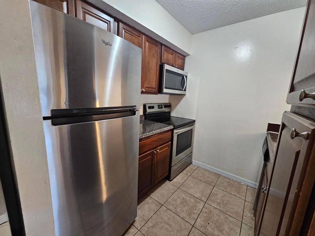 Photo of 5686 Rock Island Road #126, Tamarac, FL 33319 (MLS # B26029099)
