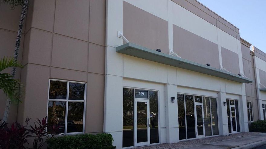 ONE OF A KIND OPPORTUNITY. 1300 SQUARE FEET, IN AN INDUSTRIAL PARK, LOCATED OFF BELVEDERE ROAD! ELEGANT ENTRANCE AND HUGE  INDUSTRIAL OVERHEAD DOOR, CEILING HEIGHT OVER 20 FEET PLUS , STIARWAY TO A 20 FEET X 13 LOFT! LOBBY IS 17X11 WITH OUTLETS, CABLE READY, 10 FOOT CEILINGS, 2 SEPARATE OFFICES, 11X10, TILED  AND 9X6, , ALL AIR CONDITIONED! PARKING FOR 3 CARS, PLUS GUESTS . INCLUDES WATER AND SEWER , and Hoa Fees.  2 FULL 1/2 BATH!s