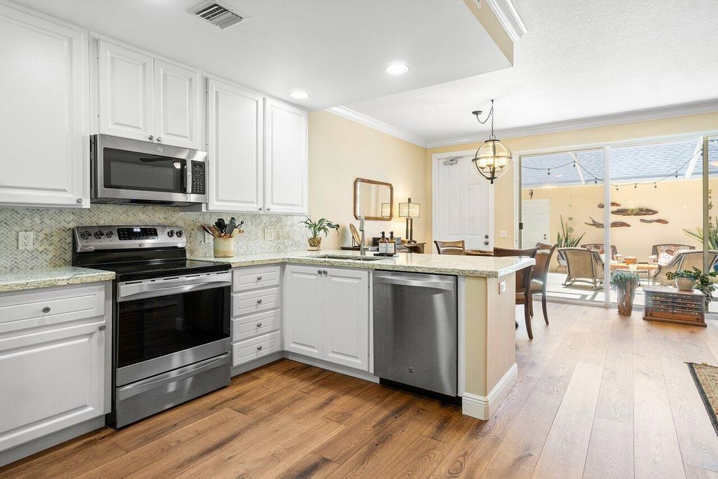 Photo of 234 Grenada Drive, Jupiter, FL 33458 (MLS # R11005631)