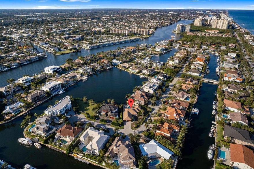 Stunning retro design home in Bel Lido section of Highland Beach, Florida.  Approx 50' of waterfront into large open bay leading to the intracoastal with no fixed bridges.  Single story, 3 bedrooms + Office, split floor plan with impact windows and doors and professionally remodeled in 2005.  Cork flooring, 3 car garage, high ceilings, and floor to ceiling windows.
