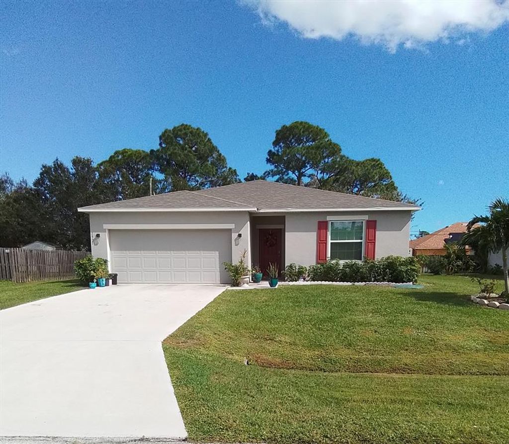 Photo of 1925 SW Cycle Street, Port Saint Lucie, FL 34953 (MLS # R10841366)