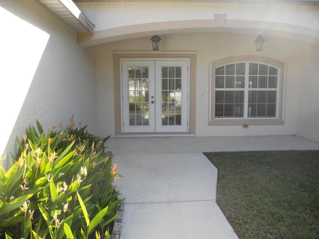 Photo of 932 SW Commonwealth Road, Port Saint Lucie, FL 34953 (MLS # R11153672)