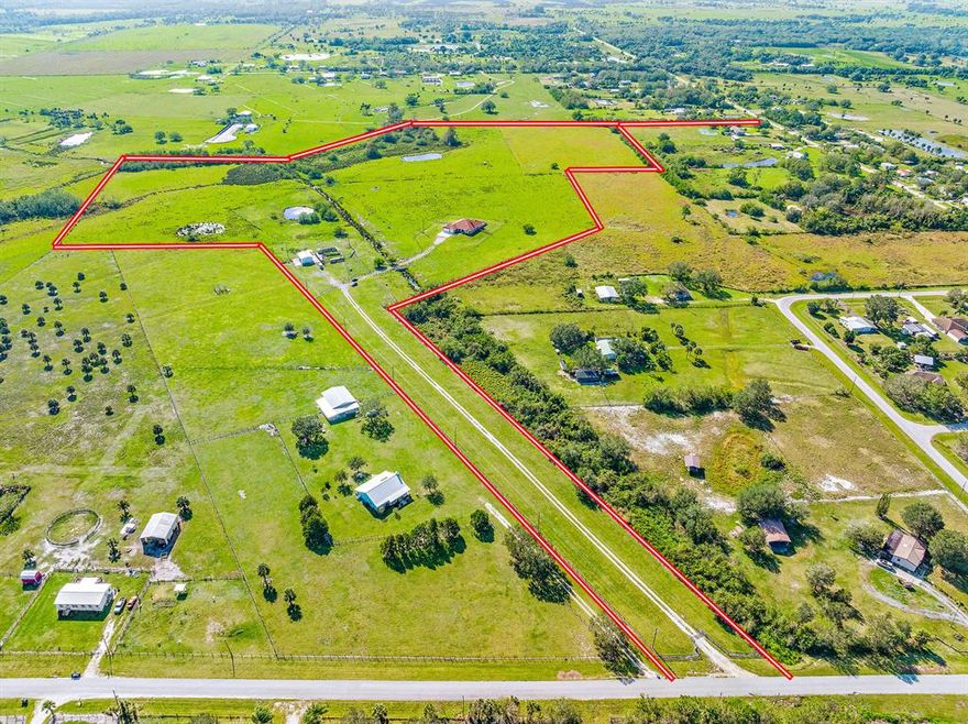 RARE OPPORTUNITY to own over 45 scenic fenced acres (on some of the highest elevation) in the heart of Okeechobee.   This ranch parcel is located just off SR70 - close to town, Lake Okeechobee and several shooting clubs. Enjoy Privacy + Serenity! This grand and green property comes with a 2007 home and  includes a metal barn with cow pens and plenty of room for cows + horses to roam.
Tons of potential for an investor or end user!