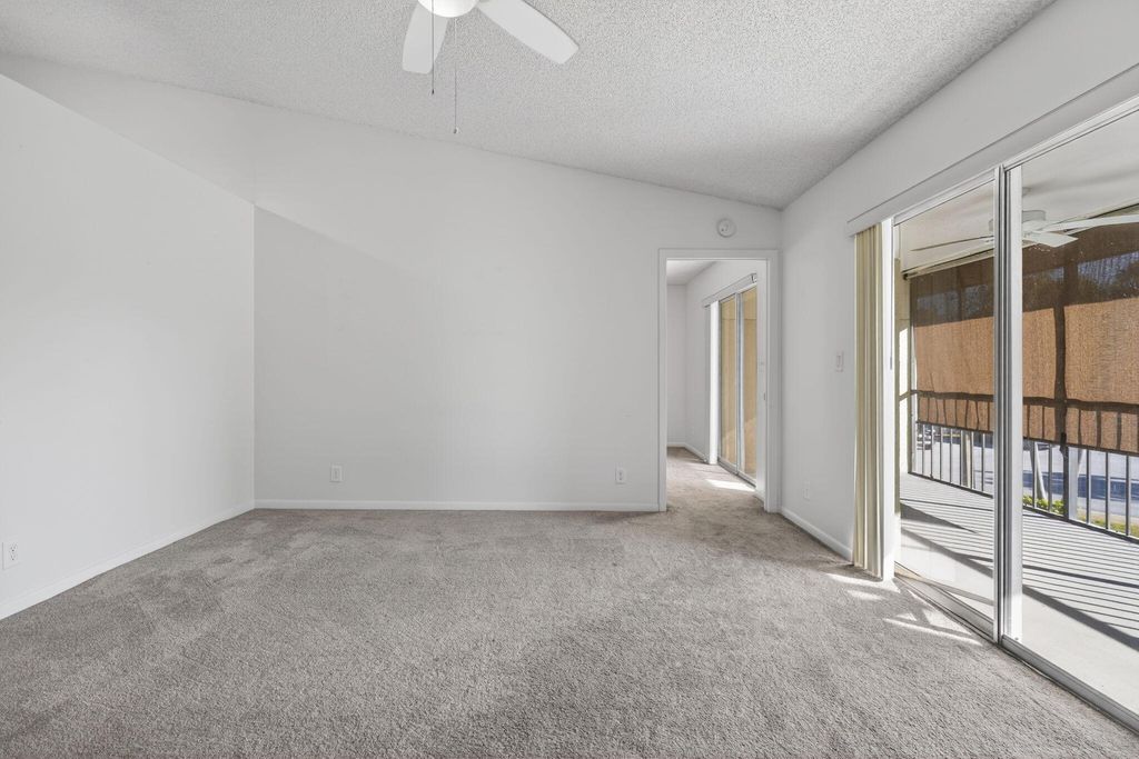 Photo of 6572 Chasewood Drive #F, Jupiter, FL 33458 (MLS # R11162518)