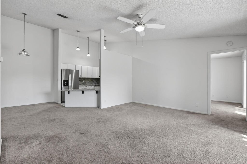 Photo of 6572 Chasewood Drive #F, Jupiter, FL 33458 (MLS # R11162518)