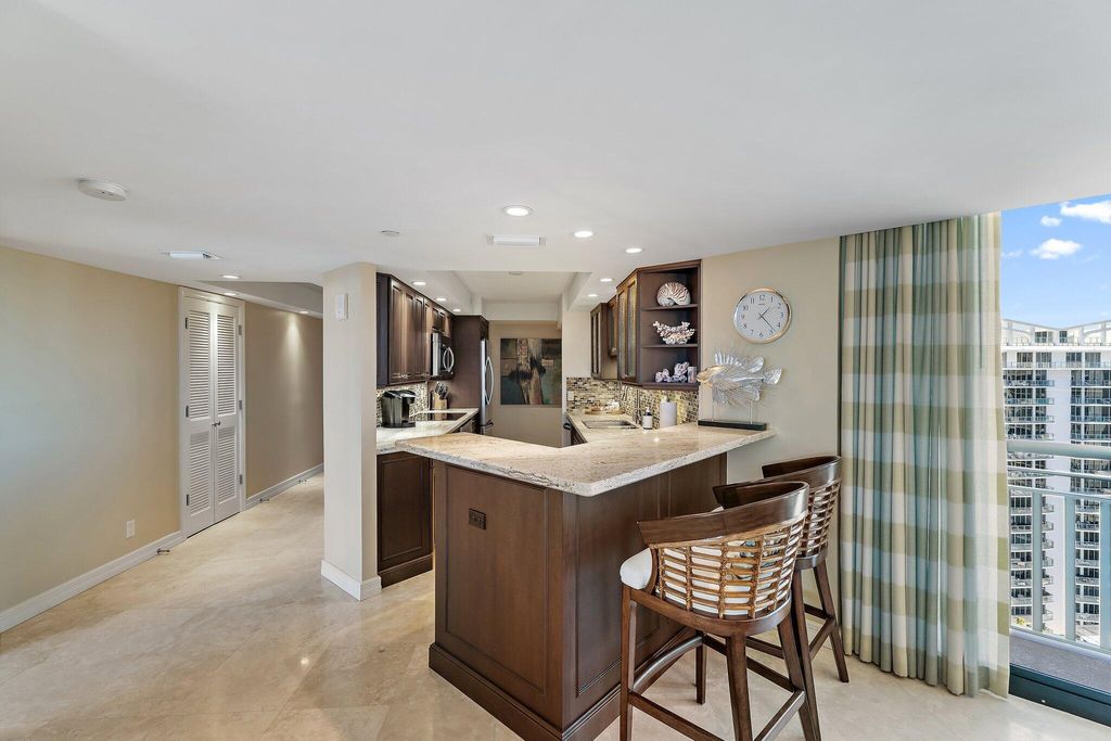 Photo of 3000 N Ocean Drive #23-C, Singer Island, FL 33404 (MLS # R11078403)