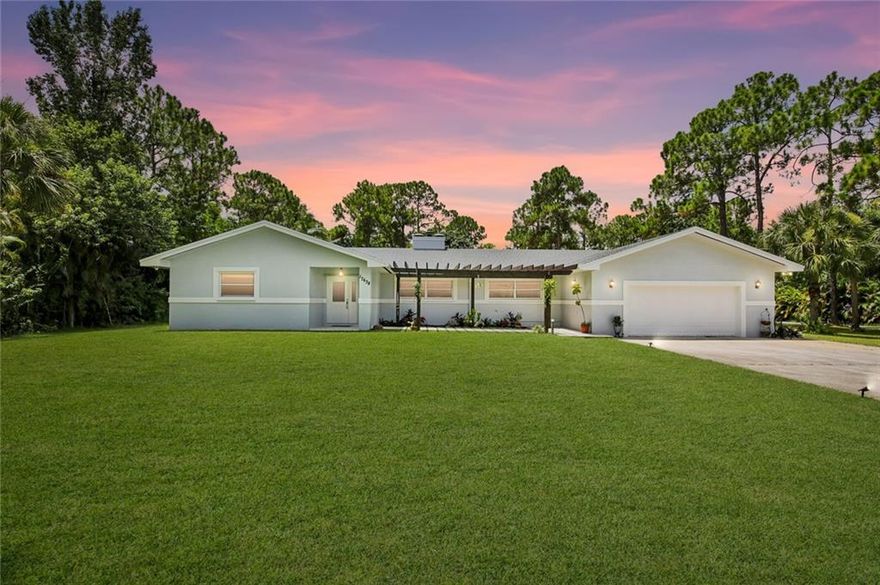 NEW 2022 ROOF! This 3 bed, 2.5 bath pool home is positioned on a 1.15 acre lot and offers a bonus room that can be used as a 4th bed/office. This well maintained property is fully fenced in with a private gate, and features an expanded driveway, new pergola, many fruit trees, new landscaping, and a large storage shed. The huge covered patio and inground pool are fully screened in and offer a great space for relaxing & entertaining. You will enjoy your afternoon visits to your private lily pond that offers so much marine life! Other features include 2 recently renovated bathrooms, new upgraded water softener, fresh interior/exterior paint, an open floor plan, spacious rooms, and natural light. The kitchen offers upgraded cabinets, new appliances, and a new farmhouse sink and faucet! NO HOA