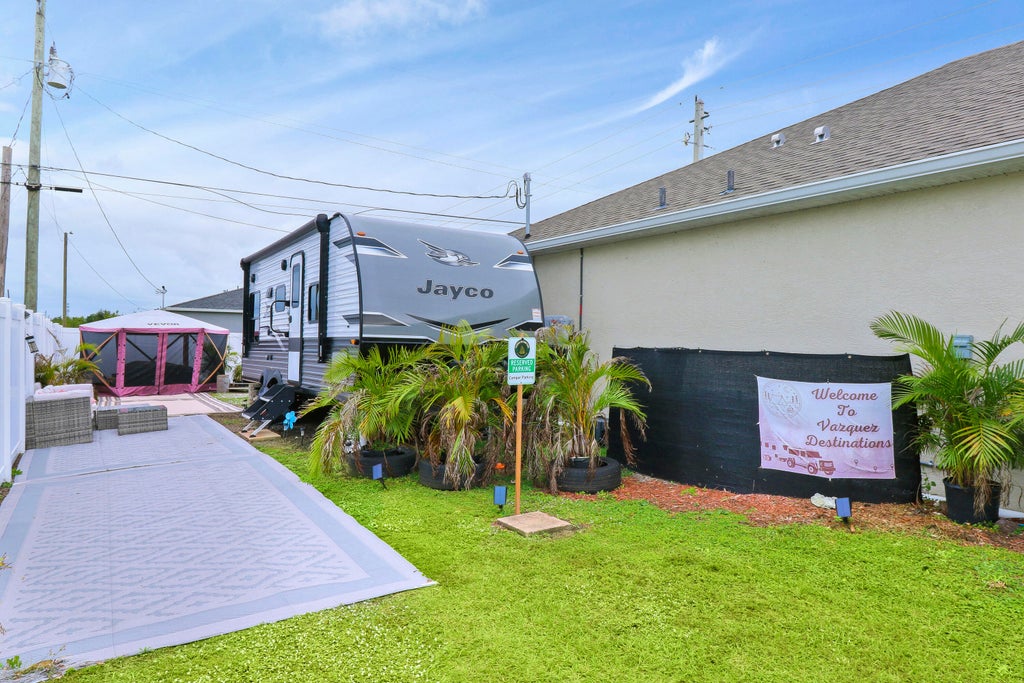 Photo of 230 SW Milburn Circle, Port Saint Lucie, FL 34953 (MLS # R10945679)