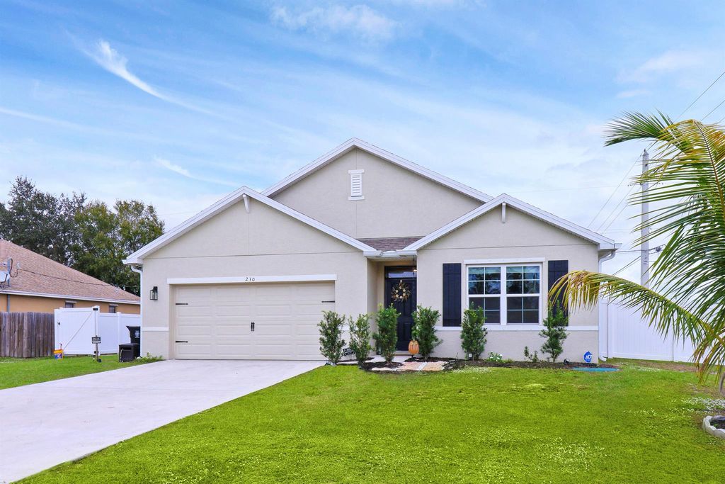Photo of 230 SW Milburn Circle, Port Saint Lucie, FL 34953 (MLS # R10945679)