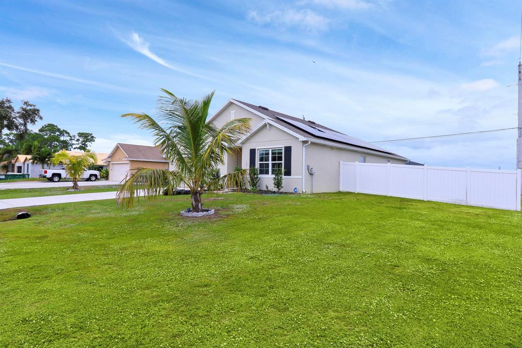 Photo of 230 SW Milburn Circle, Port Saint Lucie, FL 34953 (MLS # R10945679)