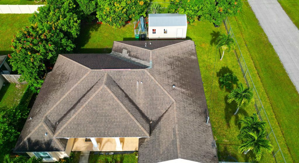 Photo of 1518 SW Hutchins Street, Port Saint Lucie, FL 34983 (MLS # R11121906)