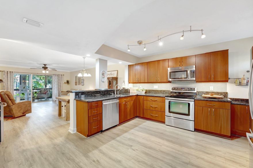 Live the South Florida lifestyle in this spacious 2 bed, 2 bath ground-floor condo in the heart of Cypress Bend. Enjoy the elegance of luxury vinyl flooring, the added peace of partial impact windows, and a layout that flows effortlessly. This resort-style community offers top-notch amenities including an almost 2-mile walking path, tennis courts, fitness center, and your unit is steps to the pool! Located near the exciting new Pomp area, home to Top Golf, Harrah's Casino, and the upcoming Live Entertainment District, this location is booming with potential and growth. Whether you're relaxing at home or exploring the neighborhood, this condo offers the perfect blend of comfort and convenience in sunny Pompano Beach.  ***Seller is willing to pay Condo fees for the remainder of 2025!