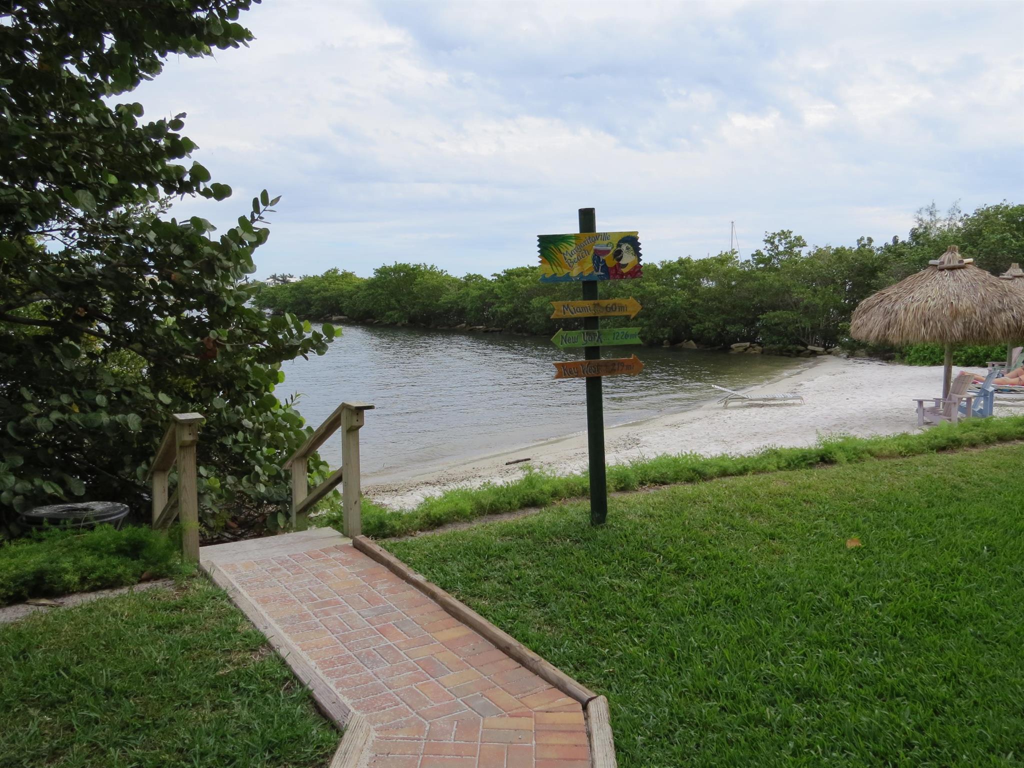 GATED INTRACOASTAL COMMUNITY. SPACIOUS, CLEAN GROUND FLOOR 1 BED 1 BATH CONDOMINIUM WITH CERAMIC TILE THROUGH OUT. OPEN KITCHEN AND LIVING AREA, BREAKFAST BAR, SUN ROOM, WALK-IN CLOSET, FULL SIZE WASHER/DYER COMMUNITY OFFERS WATERFRONT HEATED POOL & JACUZZI, FITNESS CENTER WITH SHOWERS & SAUNA, BUSINESS CENTER, COMMUNITY PRIVATE WHITE SANDY BEACH ON INTRACOASTAL AND NATURE PRESERVE.