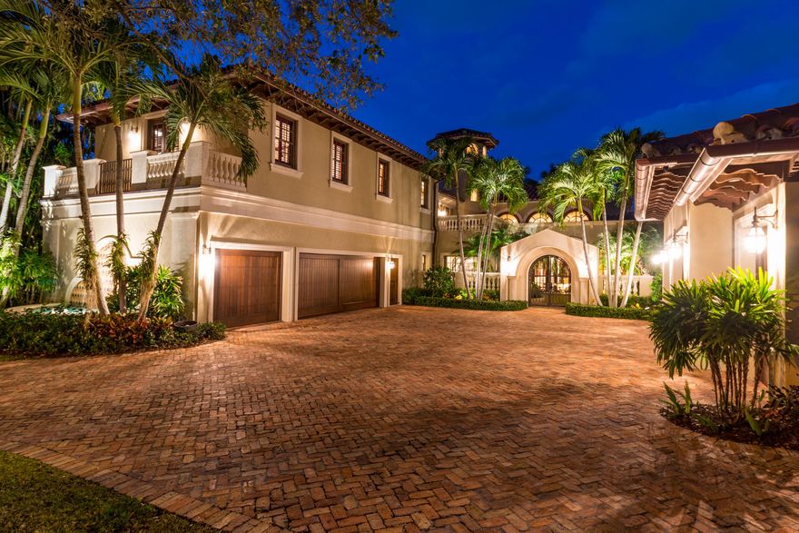 This masterfully re-modeled Spanish design is a waterfront estate located in the prestigious Admirals Cove community with a rare Social Membership.This 6 bedroom, 5.2 bath, 7 car garage home has it all! Have a viewing in your private theater, practice your put on your putting green or take a cruise on the crystal clear waters in your own back yard! Custom built cabinets, marble counters, Sub Zero & Wolf Appliances in main kitchen and in catering/butlers kitchen you will find Viking appliances. Extra large laundry room with granite tops, desk area & loads of storage. Indulge yourself in the master wing. Enter in the sitting room with TV, bedroom has French door to patio, exquisite master bath with white marble, subway tile walls, lavish shower, his/hers baths, & large tub.