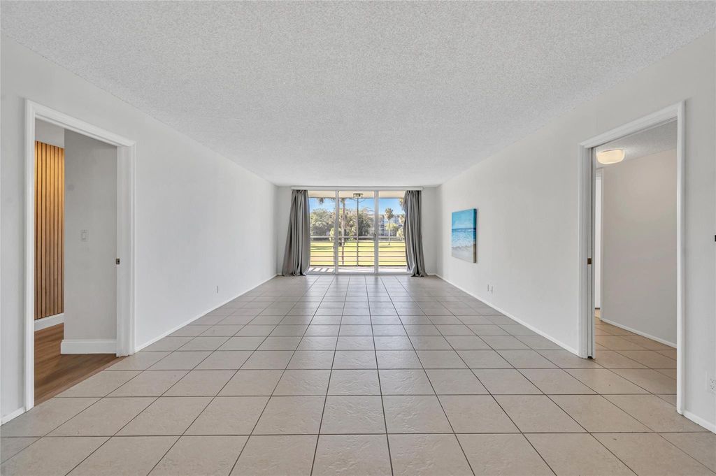 Photo of 905 Cypress Terrace #205, Pompano Beach, FL 33069 (MLS # F10483844)