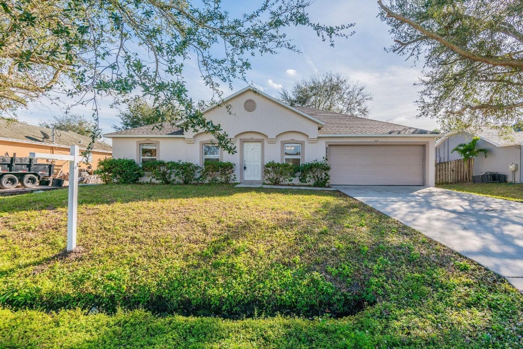 Photo of 1114 SW Abbey Avenue, Port Saint Lucie, FL 34953 (MLS # F10479057)