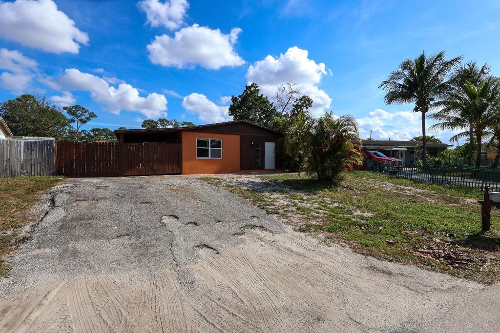 Photo of 780 Balfrey Drive S, West Palm Beach, FL 33413 (MLS # R11153840)