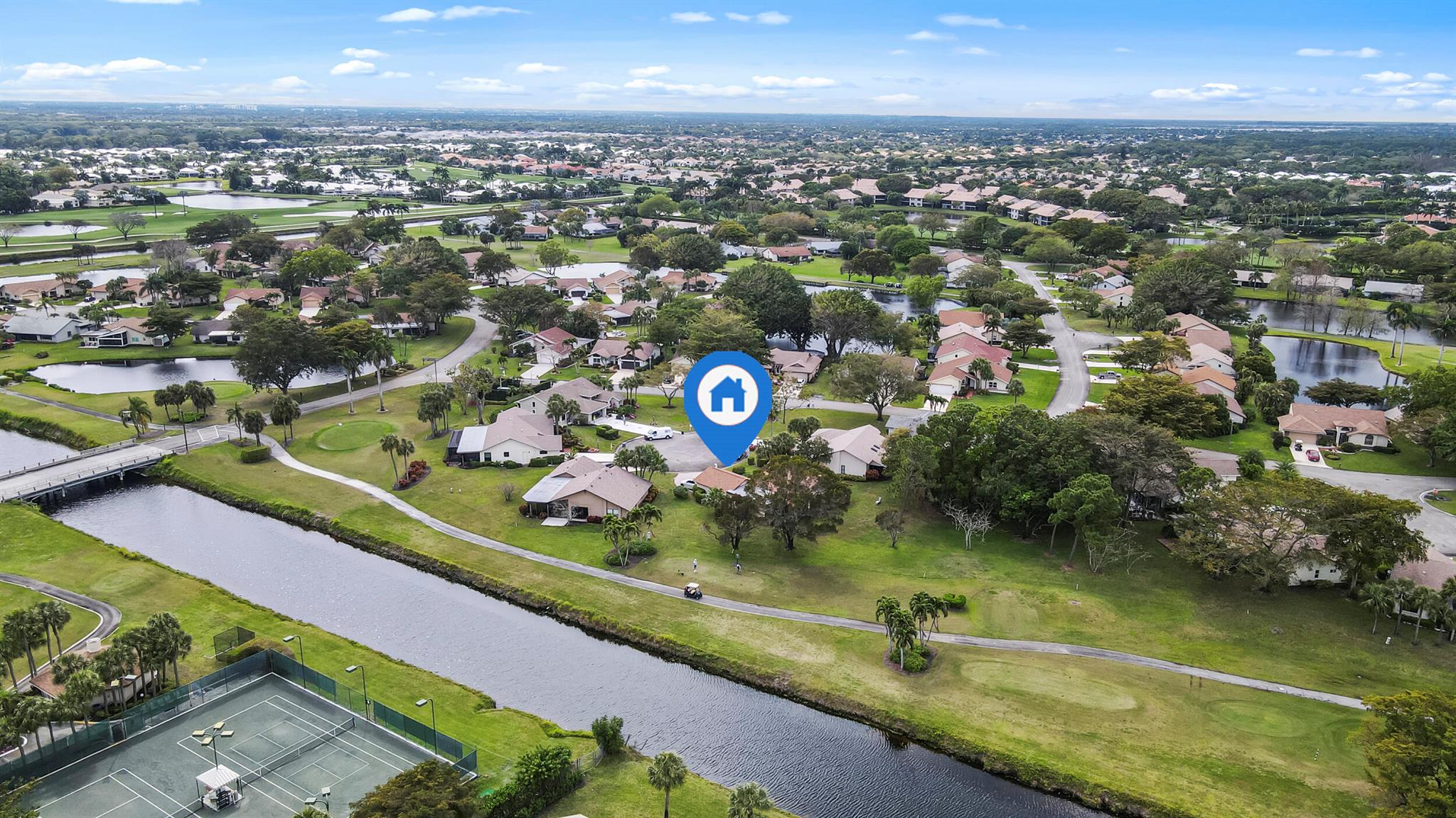 Furnished, Turnkey, Golf & Canal Views. Primary Suite with shower & King Bed, Guest room set as Den/office with a white leather sleeper sofa. Screened patio & rolldown shutters. Walk to the Newly Remodeled Clubhouse for; Activities (bingo, lectures, entertainment, Cards & more), Cafe, Golf, Fitness Center, Pickle Ball, Pool & Tennis. Pay to play,18 hole executive Par 3 & 4 Golf Course built around 12 lakes. 24 hr manned gate. Excellent central location proximate to both Boca Raton & Delray Beach. 4 miles to the beach. Lynn University is 2.5 miles away. Publix, Walmart & Restaurants nearby. Don't miss this ideal winter retreat. 55+, Community Requires 6 month lease.
