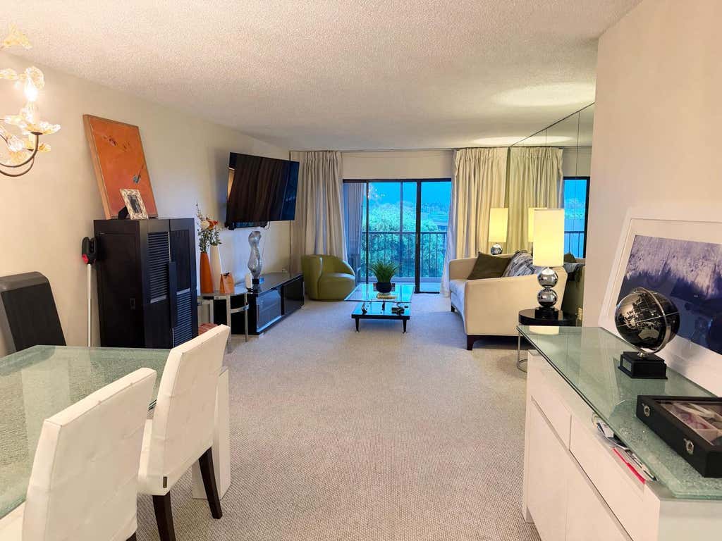 Photo of 3605 S Ocean Boulevard #A433, South Palm Beach, FL 33480 (MLS # B26043809)