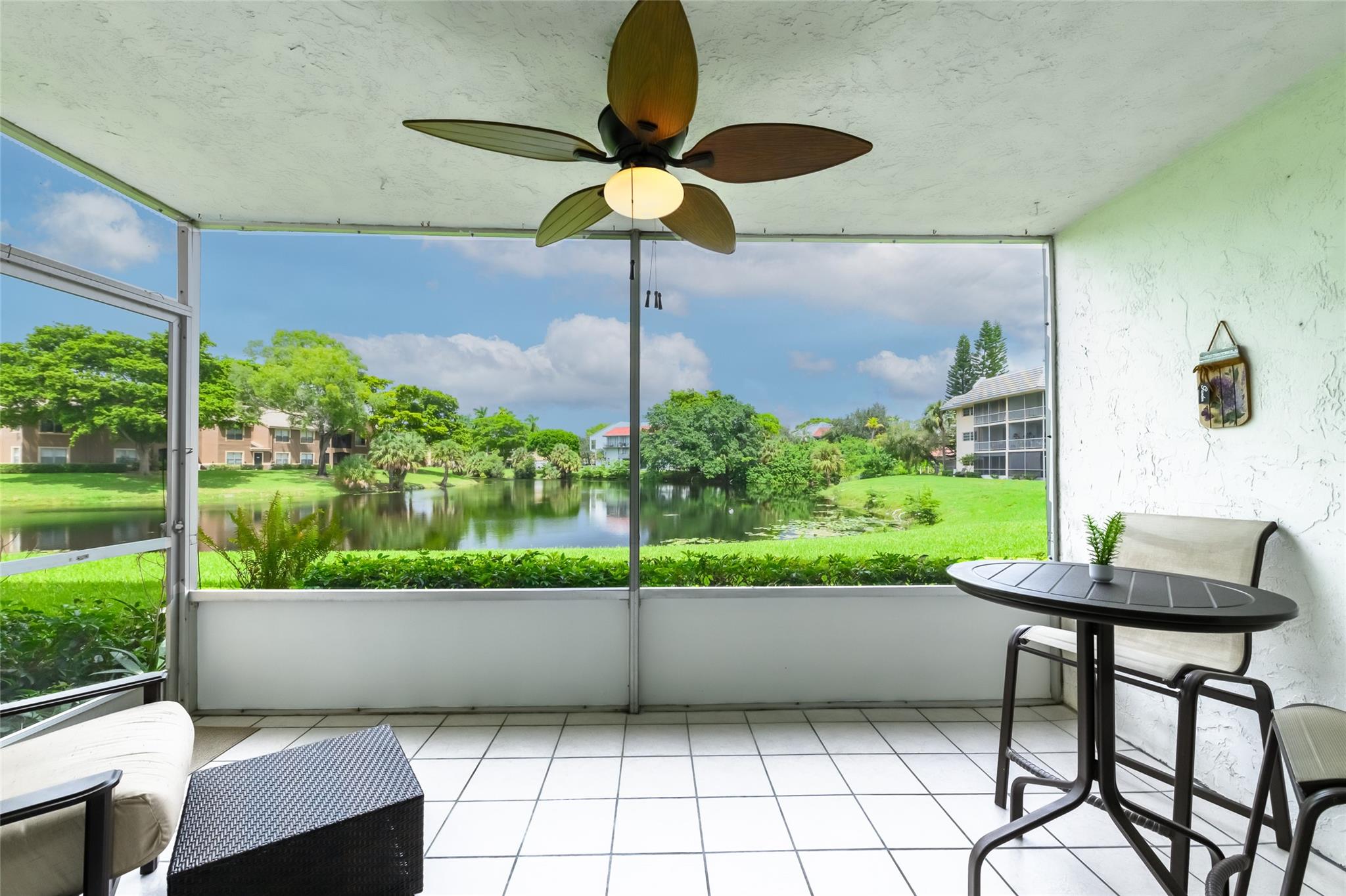 **Beautiful Turnkey Condominium for Sale**Discover this stunning first-floor condo featuring two spacious bedrooms and two modern bathrooms. Enjoy cooking in the upgraded kitchen equipped with brand-new appliances. Additional highlights include a 2023 AC unit, new windows, and a sliding glass door in 2024, complete with hurricane accordion shutters for added safety. This condo boasts a fantastic waterfront view, making it a perfect spot to relax and unwind. Located in close proximity to all amenities, it's just a short walk to restaurants, grocery stores, entertainment, and public transportation. This property is perfect for anyone looking to move right in—just bring your toothbrush!