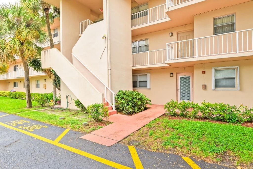 Photo of 2850 S Forest Hills Boulevard #105, Coral Springs, FL 33065 (MLS # F10526781)