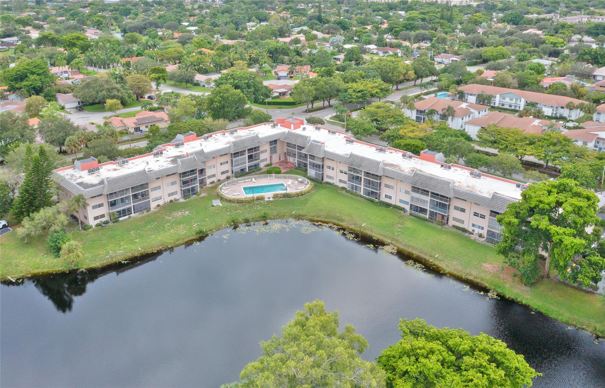 **Beautiful Turnkey Condominium for Sale**Discover this stunning first-floor condo featuring two spacious bedrooms and two modern bathrooms. Enjoy cooking in the upgraded kitchen equipped with brand-new appliances. Additional highlights include a 2023 AC unit, new windows, and a sliding glass door in 2024, complete with hurricane accordion shutters for added safety. This condo boasts a fantastic waterfront view, making it a perfect spot to relax and unwind. Located in close proximity to all amenities, it's just a short walk to restaurants, grocery stores, entertainment, and public transportation. This property is perfect for anyone looking to move right in—just bring your toothbrush!