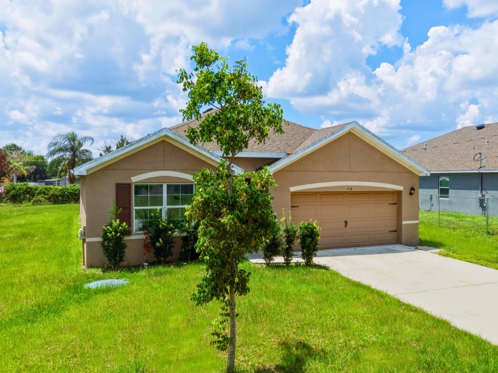 Photo of 718 SW Crean Terrace SW, Port Saint Lucie, FL 34953 (MLS # B26045401)