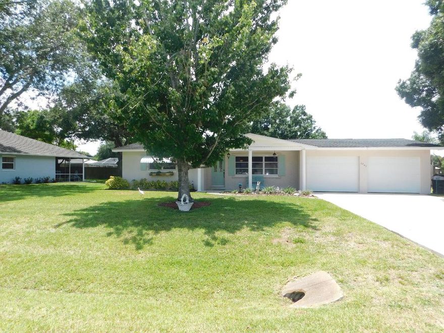 Upgraded Waterfront CBS home on a street with well-maintained, nice homes. Completely fenced yard with a tranquil view of the lake and a Doughboy, above ground, salt water pool. This home features a 2017 A/C; newer washer, refrigerator, and stove; special electrical outlet for the generator (included); portable A/C unit also included; and, complete protection for hurricanes. The large oversized garage is perfect for all your toys.