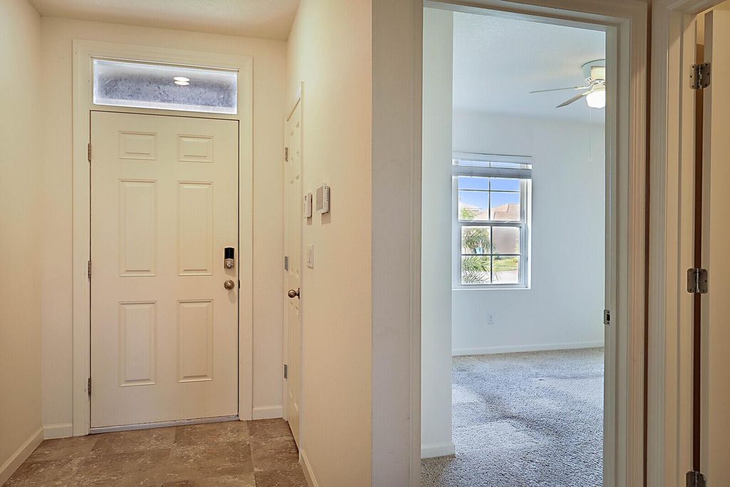 Photo of 10475 SW Toren Way, Port Saint Lucie, FL 34987 (MLS # R10984045)