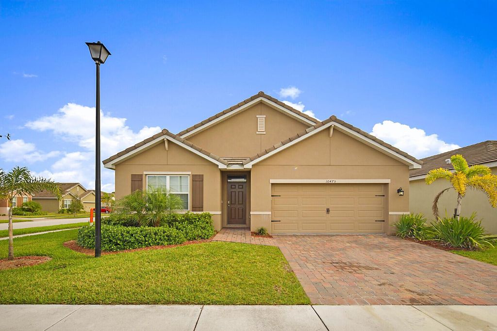 Photo of 10475 SW Toren Way, Port Saint Lucie, FL 34987 (MLS # R10984045)