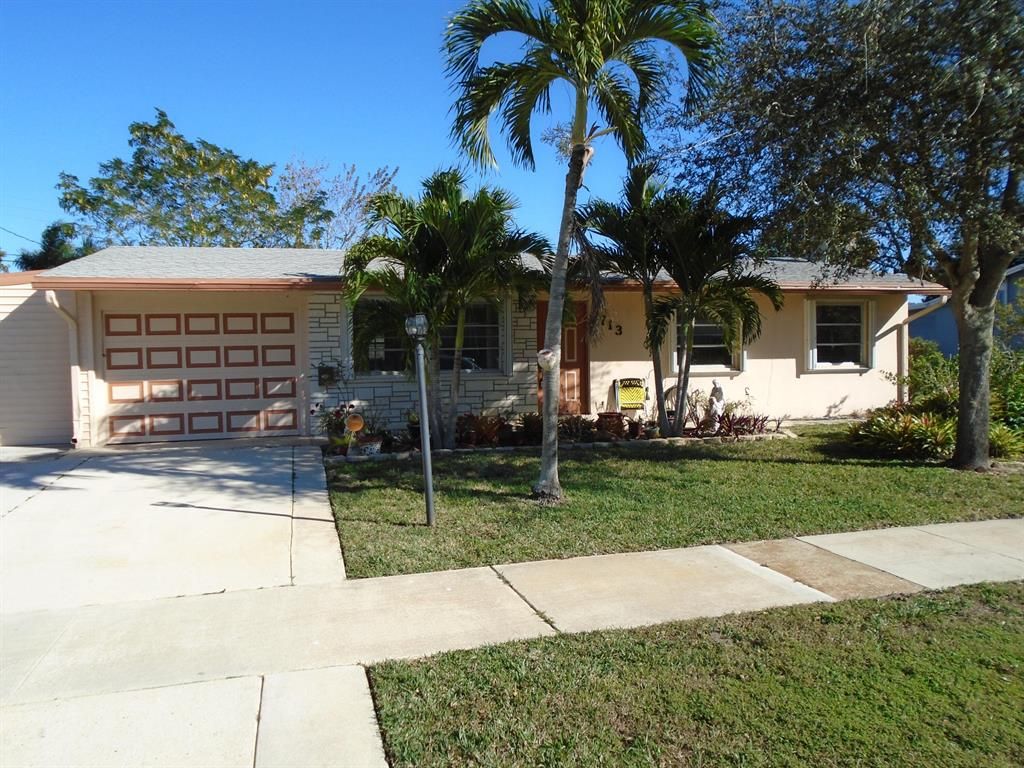Photo of 713 Buttonwood Road, North Palm Beach, FL 33408 (MLS # R10773646)